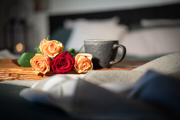 Fresh hot coffee and roses in bed. Romantic background for valentine's day day ore mothers day.