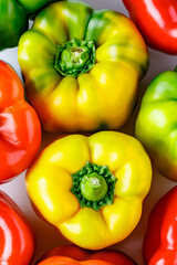 Colorful bell peppers.Close up of assorted red and yellow bell peppers(bell pepper,capcicum). Also known as Sweet pepper, Pepper or Capsicum.top view