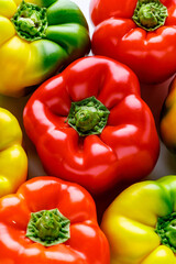 Colorful bell peppers.Close up of assorted red and yellow bell peppers(bell pepper,capcicum). Also known as Sweet pepper, Pepper or Capsicum.top view
