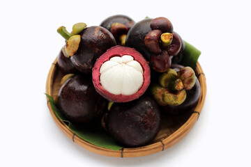 Fresh mangosteen fruit on white background.
