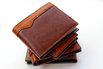 Brown wallets on white background.