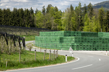 Container site next to the plantation of columnar apple trees