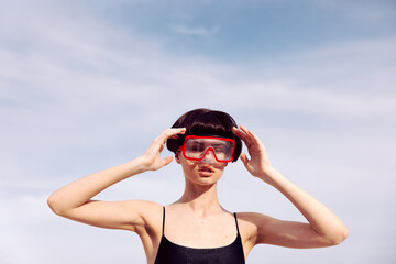 Tropical Bliss: Smiling Woman in Red Snorkeling Fashion, Enjoying Vacation by the Beach