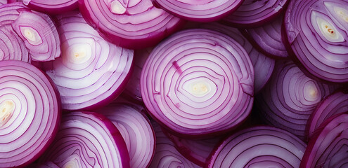 A close up of many onion slices. The onions are cut in half and arranged in a pattern
 - obrazy, fototapety, plakaty