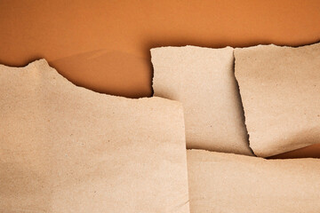 Packaging of eco-materials. Packaging paper on a brown background. Concept saving the planet from...