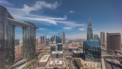 Futuristic Dubai Downtown and financial district skyline aerial all day timelapse.