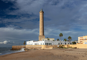 Fototapeta na wymiar Chipiona lighthouse also known as Punta del Perro Light, an active 19th-century lighthouse in the province of Cádiz, Spain is the seventeenth tallest 
