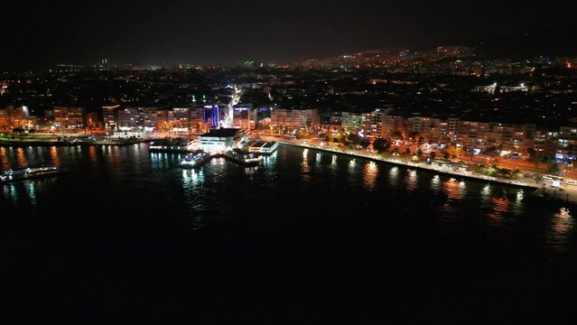 izmir karsiyaka district, sea and ferries and traffic n aerial view with drone on a sunny day. High quality 4k footage