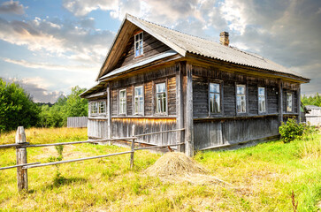 Old abandoned rural wooden house in russian village - 718991238
