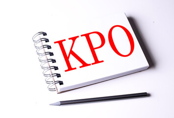 Text KPO on notebook on the white background