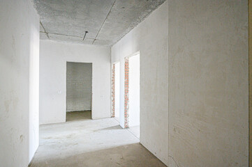 rough repairs for self-finishing. interior decoration, bare walls of the room, stage of construction. interior apartment room
