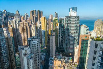 Fototapeta na wymiar City top view of Skyscrapers building Hong Kong city, cityscape flying above Hong Kong City development buildings, energy power infrastructure Financial and business center Asia