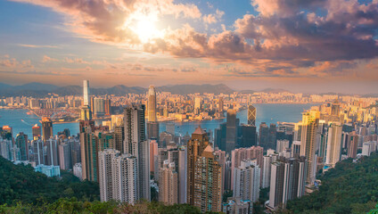 Wonderful panoramic of Hong Kong city view from Victoria Peak, modern cityscape during sunset in...