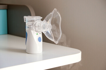 Oxygen mask of nebulizer with steam, medical equipment for pneumonia, covid, sars and bronchitis...