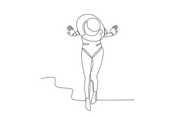 A woman sunbathing on the beach