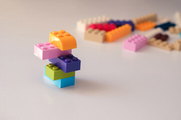Plastic lego building blocks isolated on white background - obrazy, fototapety, plakaty