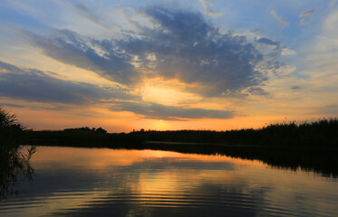 sunset on lake - 719035290