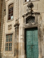 Entrance to the ancient cathedral, beautiful green decorative door