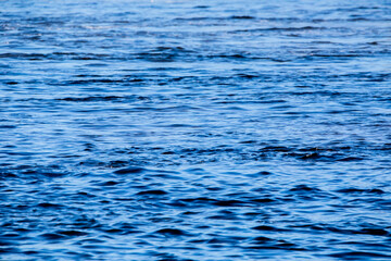 Blue water of the Mississippi River on a winter day in January in Iowa. 