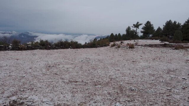 Tehri Garhwal : First snowfall blankets Himalayan meadows in Garhwal, Uttarakhand, India.