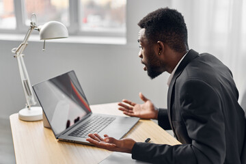 Fototapeta na wymiar online man using education african student freelancer job laptop computer office american