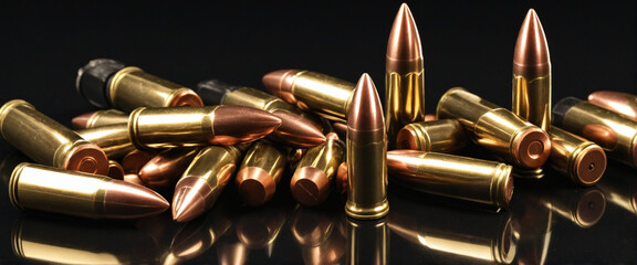 High-powered rifle shooting ammunition on black backdrop for tactical operations banner with space for text - Automatic Weapon Fire