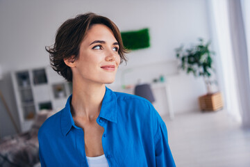 Photo of creative gorgeous minded person look interested window brainstorming inspiration modern...