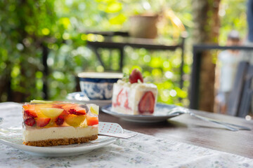 Close up and selective background with copy space of delicious and colourful jelly pie cake served in beautiful plate on the table for dessert or sweet meal, and also fatty and high calorie foods.