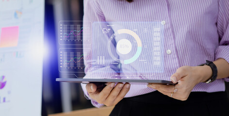 Business hands using digital tablet with business infographic data concept, Analytics data dashboard.