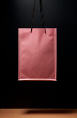 Pink shopping bag on black background.Minimal creative fashion Trendy social mockup concept with copy space.Top view,generative AI