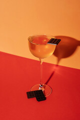 bright cocktail decorated with chocolate