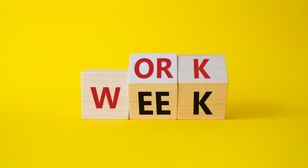 Work Week symbol. Turned wooden cubes with words Work Week. Beautiful yellow background. Business and Work Week concept. Copy space