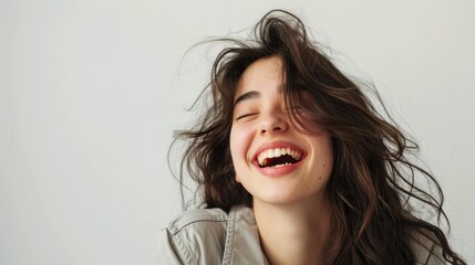 Portrait of happy asian  woman in casual clothes, laughing and having fun, smiling cheerful at camera, standing against white background
