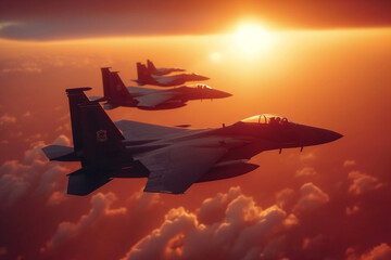 Military planes fly above the clouds at sunset.