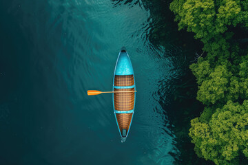 a canoe floating with trees above it in a clear lake