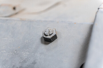 Gray bolt connection, close-up, metal detail