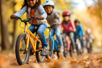 Fototapeta na wymiar a diverse group of kids enjoying a group bike ride in the autumn park