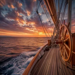 Foto auf Alu-Dibond Ship Wheel on Yacht amidst Vast Sea and Sky at Sunset. © Nim
