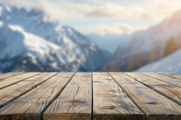 The empty wooden table top with blur background of Alpine with snow capped. 