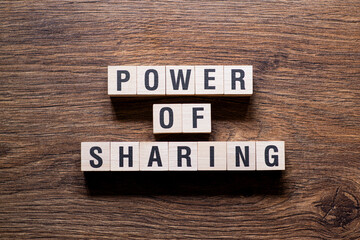 Power of sharing - word concept on building blocks, text