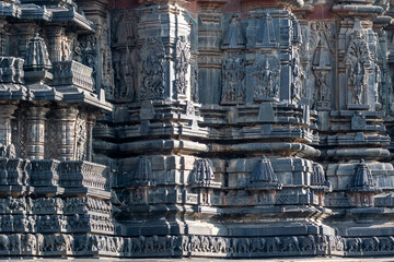Fototapeta premium Ornate carvings of a Hindu deities at the ancient Hoysala era Chennakeshava temple in Belur, Karnataka.