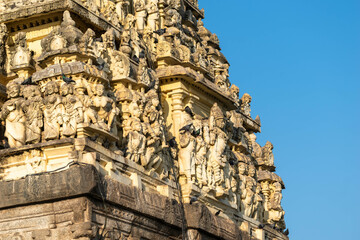 Fototapeta premium Carvings of Hindu deities and figures on the gopuram tower of the Chennakeshava temple in Belur, Karnataka.