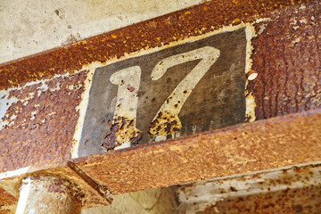 Rusted Metal Texture with Faded Number 17 Close-Up