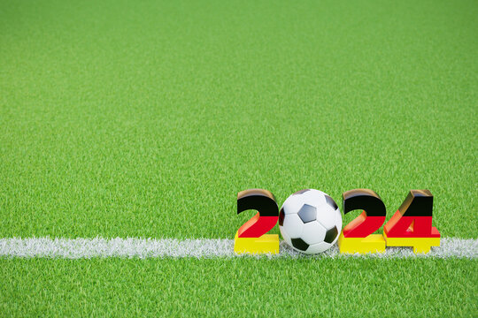 Soccer events in Germany in 2024 concept. A Soccerball within the digits 2_24  colored with the German flag colors on a green grass surface with a chalk line.