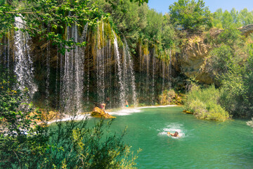 Molino de San Pedro's Enchanting Cascade, a Harmonious Symphony of Nature in Sierra de Albarracín's Splendid Landscape. Serenity of This Untouched Wilderness with its crystal clear waters. © Alejandro Vicente