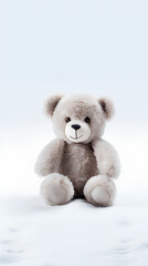 Brown teddy bear. Plain white background.