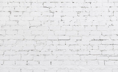 Old white brick wall background. White brick wall texture with white cracked paint. Abstract white brick wall wallpaper. 