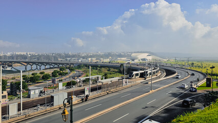 Rabat, Morocco - January 10, 2024 ; Traffic on Hassan II bridge and Rabat Tramway passing , with...