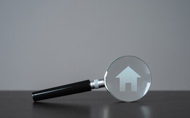 House and magnifying glass. Take a mortgage. Investments in immovable assets. Property Inspection...