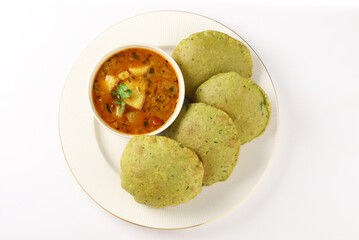 Indian cuisine - Puri Bhaji. It is a traditional breakfast dish in North India. Puri is a deep...